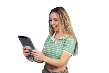 Teenager smiling cheerfully while using digital tablet