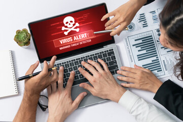 Virus warning alert on computer screen detected brisk cyber threat , hacker, computer virus and malware