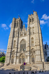Fototapeta premium The Cathedral of St. Michael and St. Gudula medieval Roman Catholic cathedral Brabantine Gothic architecture style building with bell towers in Brussels city historical center, vertical view, Belgium