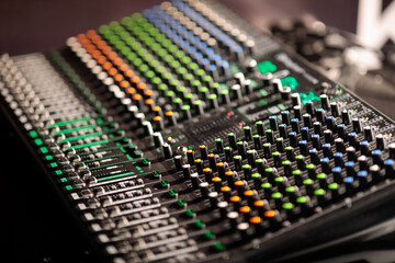 close up of professional studio sound mixing desk
