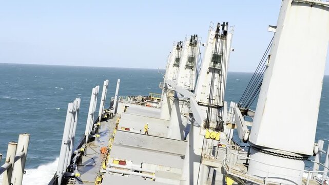 Real video of a cargo ship (bulk carrier) experiencing rolling and motion on ocean swell. Everyday life at sea, maritime weather, waves and working conditions of seafarers during ocean voyages.