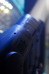 row of moving heads stage lighting fixtures