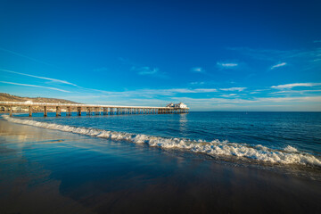 Malibu Pier seen from Surfrider Beach at sunset