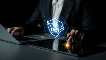 Concept of occupational health and safety. A 'Safety First' policy ensures worker protection...