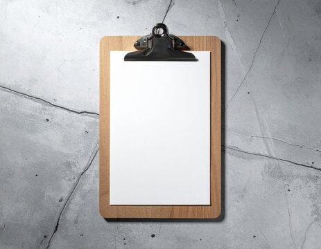 Wooden Clipboard With Blank Paper On Textured Concrete Surface Detailed Top View