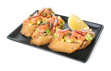 Delicious bruschettas with salmon, avocado, capers, onion and lemon slice isolated on white