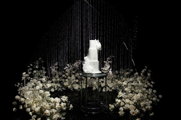 Elegant White Wedding Cake with Floral Decoration in Luxury Event Setup