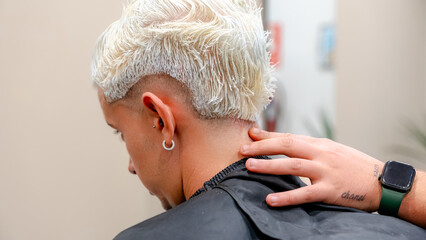 Barbershop hair bleaching process with client