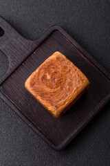 A French cube croissant with chocolate filling, a sweet breakfast pastry. Cube croissant