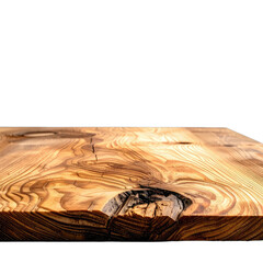 Close-up view of richly grained wooden surface against a black background.