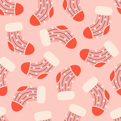 Seamless pattern with cute Christmas socks. Festive winter holiday design for Christmas, New Year. Perfect for banner, wallpaper, wrapping paper, background, card, poster. Vector illustration