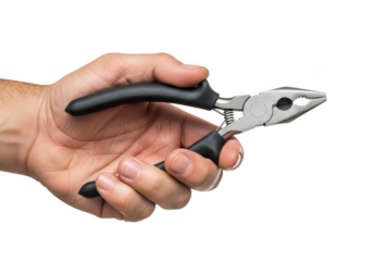 A human hand firmly grips a pair of black handled wire cutting pliers tool isolated on transparent background
