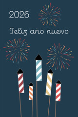 2026 Feliz a&ntilde;o nuevo - Schriftzug in spanischer Sprache - Frohes neues Jahr. Gru&szlig;karte mit bunten Silvesterrakaten und Feuerwerk.