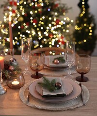 Festive table setting with Christmas decor indoors, closeup
