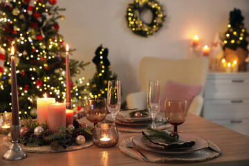 Festive table setting with Christmas decor indoors, closeup