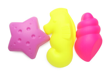 Bright children's beach toys isolated on white, top view