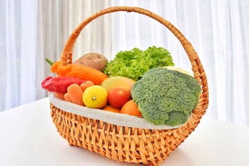 Basket with vegetables and fruits.Healthy eating.