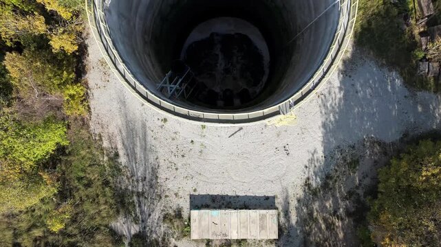 Top-Down Drone View of Industrial Water Tower with Flowing Water, Paljassaare - 4K Drone Video
