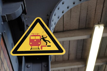 warning sign on a rail road