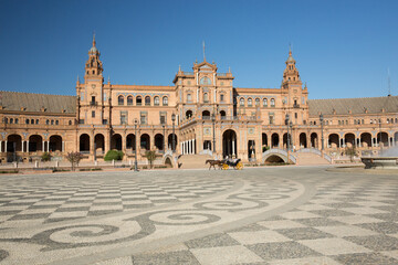 The Plaza de Espana, located in the Parque de María Luisa (Maria Luisa Park),was built in 1928 for...