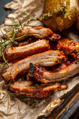 Barbecue pork ribs with rosemary closeup