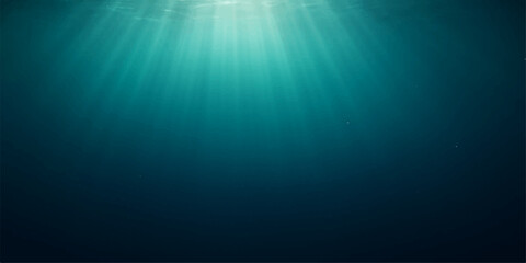 Fototapeta premium Deep blue underwater ocean scene with sun rays bursting through the water