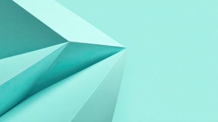 Teal geometric shapes create an abstract background with sharp edges.