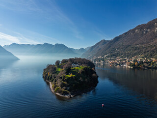 View of Comacina island from the village of Ossuccio on Lake Como