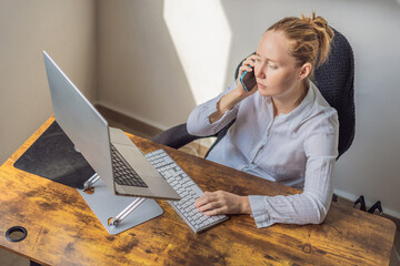 Woman working in her home office, focused on her laptop and daily tasks, creating a calm and productive workspace. Remote work, professional lifestyle and modern productivity concept representing