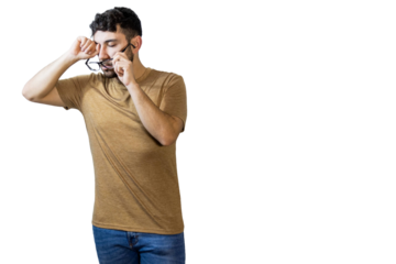 Young man rubbing eyes and removing glasses on white background. PNG