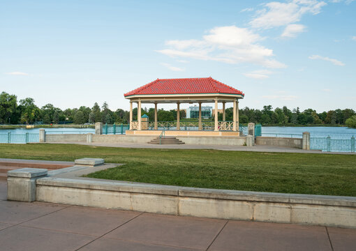 The Bandshell Gazebo at Denver's City Park used for Concerts, Festivals and Special Events. The Denver Museum of Nature and Science across the lake is visible in the background through the Gazebo.