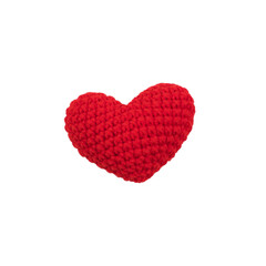 Red knitted heart isolated on white background.