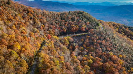 Aerial view of fall colors in the mountains.
