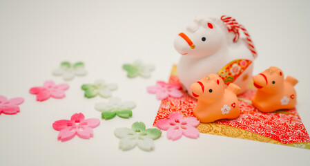 桜と午親子の正月背景