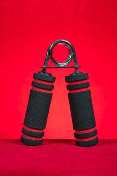 hand trainer on a red background