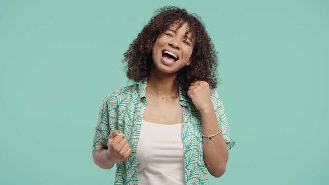 African Young Woman Makes Victory Gesture Yes,Clenched Fist,Joy Triumphant Lady 