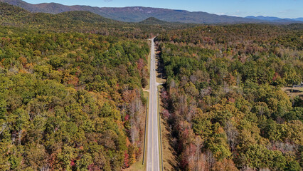 Aerial view of fall colors in mountains
