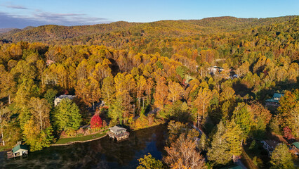 Aerial view of fall colors in mountains
