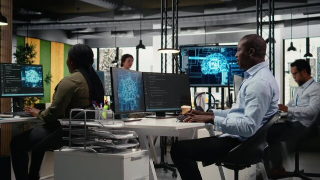 Data scientists doing brainstorming in office, using specialized hardware to accelerate complex AI calculations. IT professionals collaborating, managing deep learning datasets systems, camera A