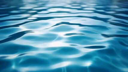 close up macro of water ripples with shimmering sunlight and soft gentle motion