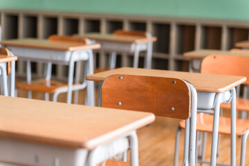 Image of a classroom with a blackboard and school building (lockers)
