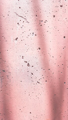 textured pink cement wall background with shadows. Copy space 