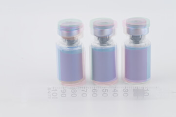Multiple Exposure Photo of Glass Vials with Various Color Labels