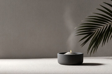 minimalistic still life, tranquil ambiance captured in a serene still life of ashes, palm leaves, and a candle