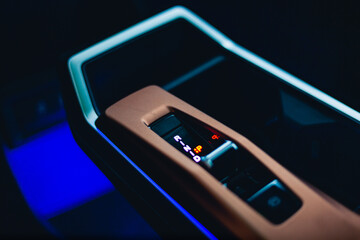 Futuristic car interior with illuminated control panel