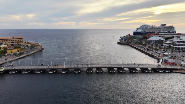 4K 60FPS Footage: Willemstad (Day). Colonial Houses, Queen Emma Bridge, and Cruise Ship.