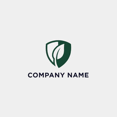 A logo featuring a dark green shield with a white stylized leaf inside, accompanied by the text 
