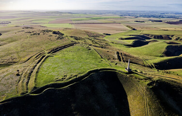 Oldbury Castle Iron Age hillfort, Wiltshire, aka Oldberry. 5 km W of Avebury. View from NW. The obelisk monument was built 1845 by Lord Lansdowne
