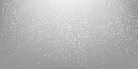 Beautiful falling snow Christmas background. Subtle flying snow flakes and stars on light grey background. Actual winter silver snowflake overlay template. Brilliant vector illustration.
