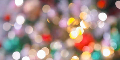 Beautiful defocused blurred Christmas tree lights bokeh for Christmas festive background holiday
